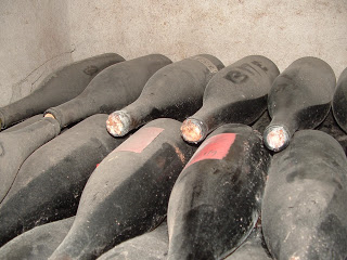 Bottles in Beaune wine cellar